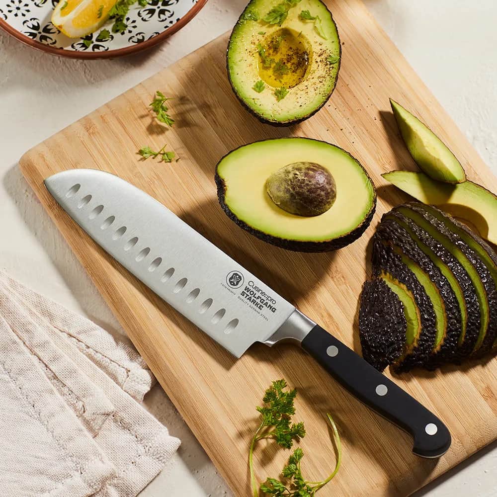 THE CUSTOM CHEF™ Santokuknive Cuisine::pro® WOLFGANG
STARKE™ Cuisine::pro WOLFGANG STARKE™ Santokukniv i Sølvfarvet/sort, 18 cm, 2