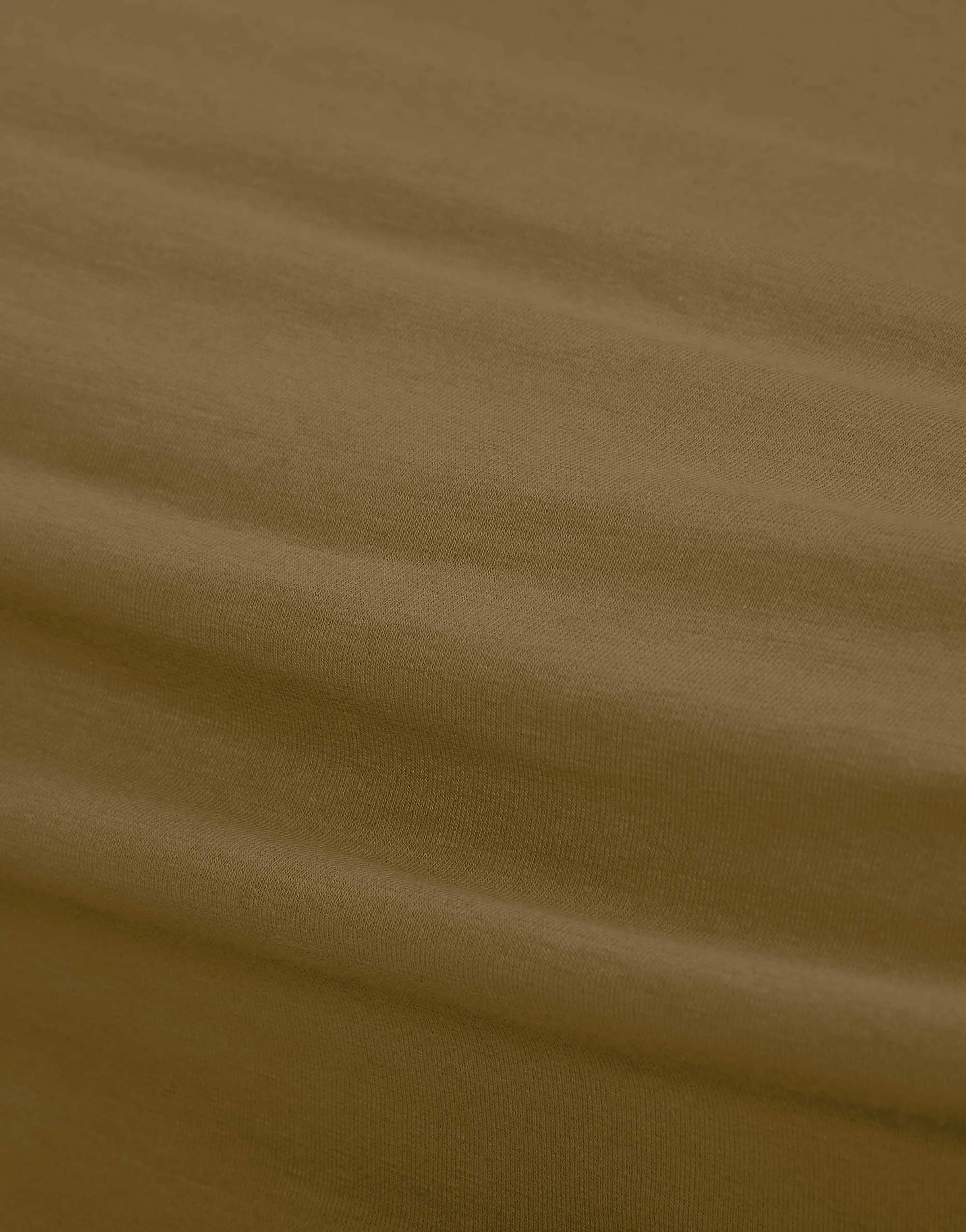 Essenza Lagner The Perfect Organic Jersey Organic Jersey Boxlagen i Olivengrøn, B100 x L220 cm, 2
