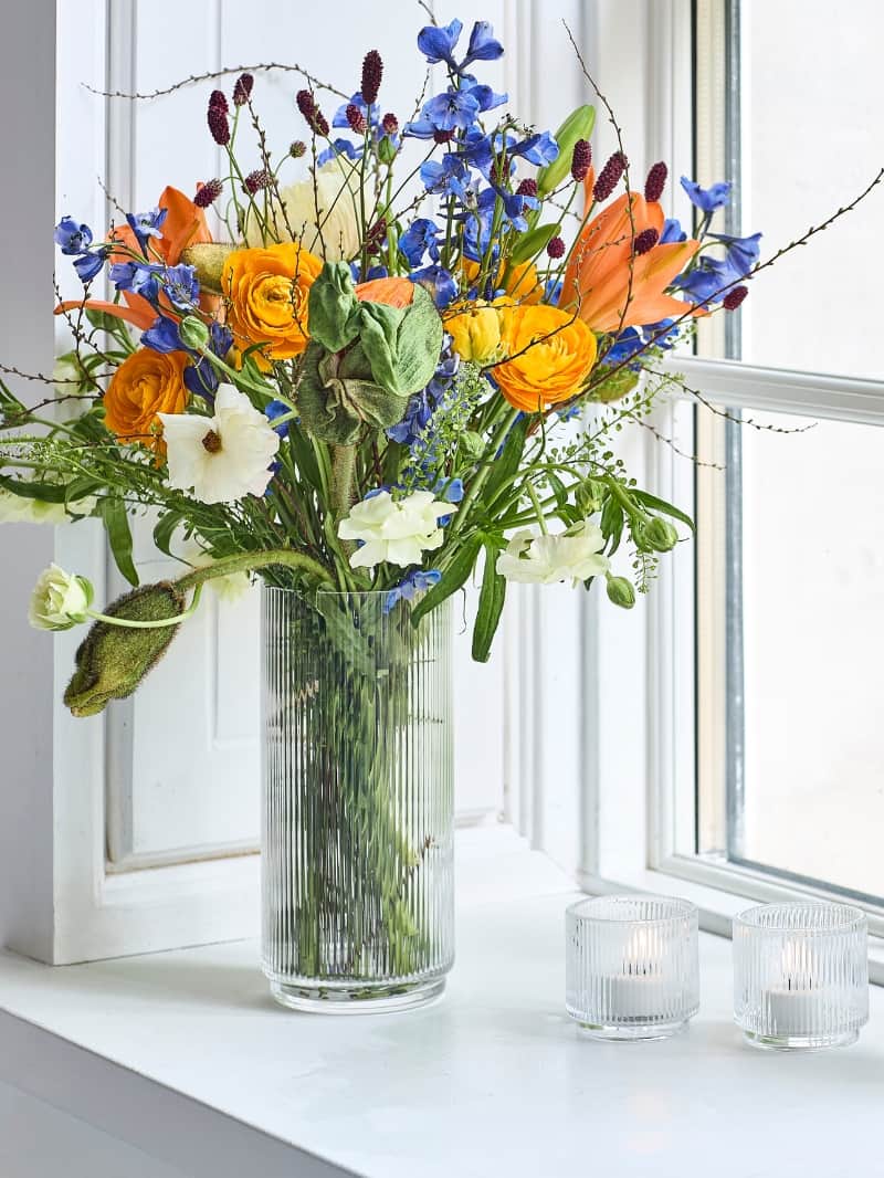 Vase med blomster til fars dag