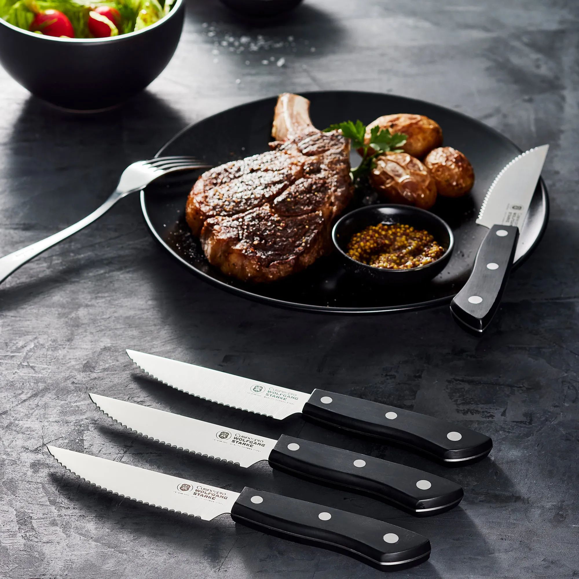 THE CUSTOM CHEF™ Steakknive Cuisine::pro® WOLFGANG
STARKE™ Cuisine::pro WOLFGANG STARKE Steak Knivsæt - 4 dele i Sort, 2
